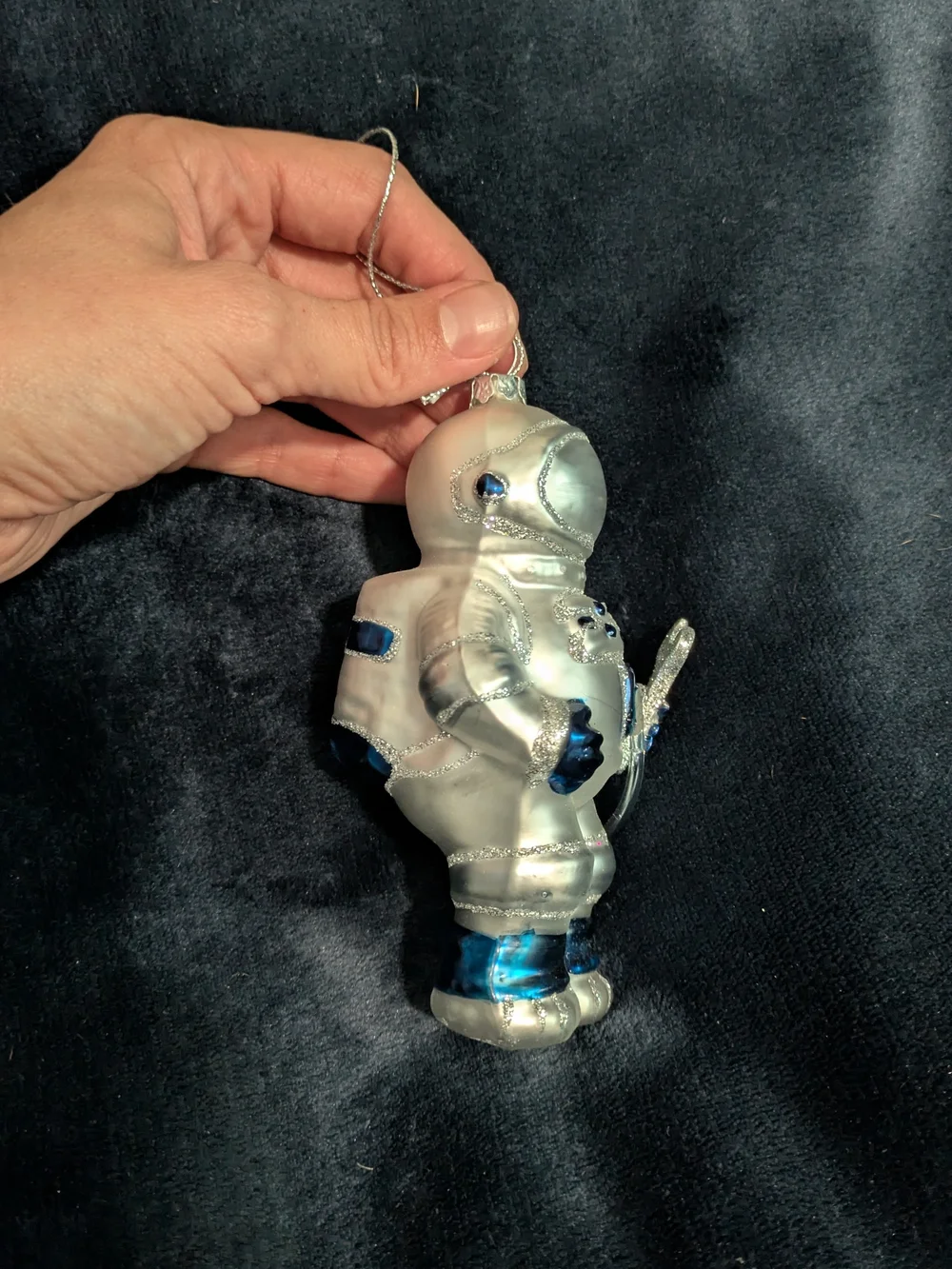 Silver and Blue Astronaut Ornament Holiday Glass Ornament